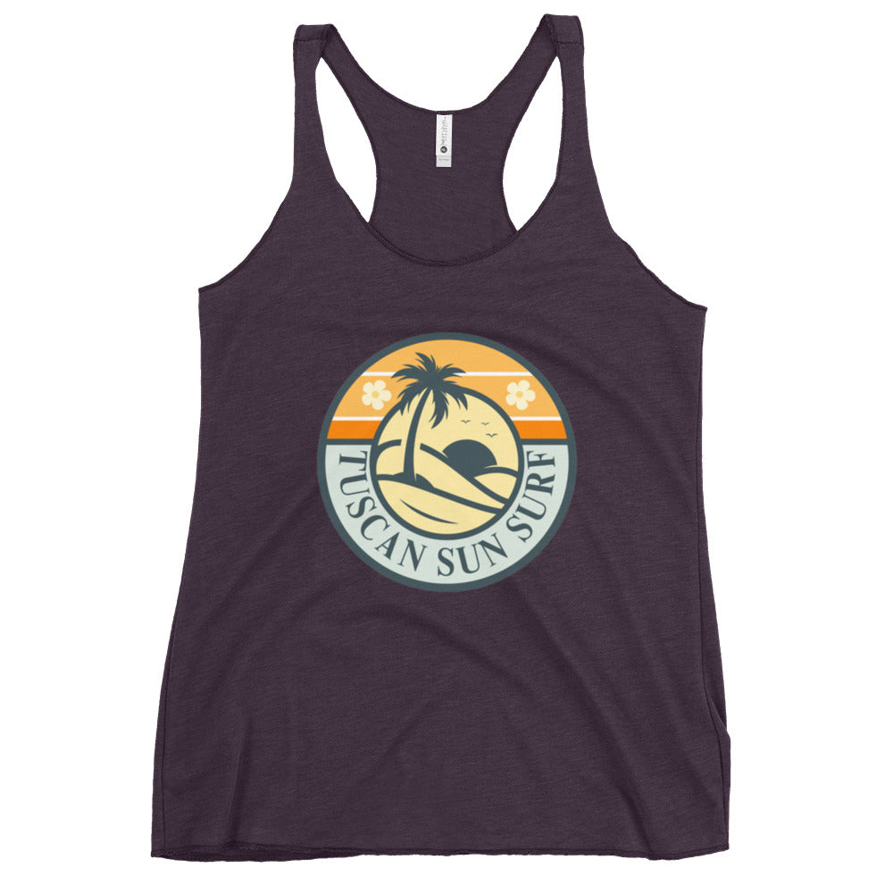 Women's vintage purple racerback tank top with dark teal basic palm tree and sun in a circle design with Tuscan Sun Surf text.