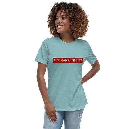 Women's heather blue lagoon color t-shirt with the Tuscan Sun Surf logo across the front